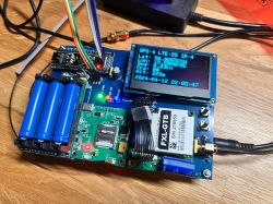 Mobile GPS Tracker with OLED Screen Mobile GPS tracker with OLED screen and various components on a PCB.