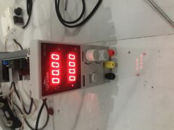 TopsHak laboratory power supply with digital display showing 0.00V and 0.00A on a table.