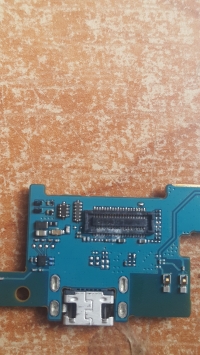 LG k10 (2017) M250n Post-Liquid Contact: Center Speaker Not Working Despite Successful Tests