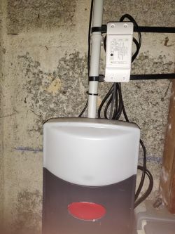 Garage Door Controller on the Wall Garage door controller mounted on the wall next to the drive unit.