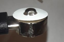 Corrosion in AA Battery Connection Close-up of corroded connection in AA lithium-ion battery.