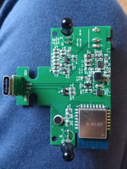 Close-up of green PCB with USB-C port and electronic components