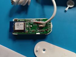 PCB with Wi-Fi module and wire, without device casing.