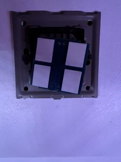 Front panel with touch buttons on the wall.