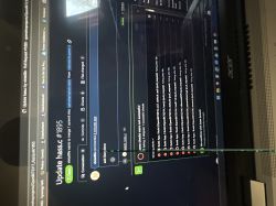 Laptop screen showing a GitHub pull request page for Update hass.c #1895