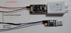 Programming PCB with UART Programmer Connected UART programmer to PCB board with connection labels.