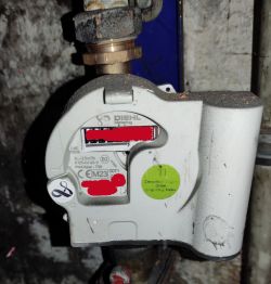 Diehl Metering Water Meter with IZAR Radio Module Diehl Metering water meter with IZAR radio module, showing model markings and labels.