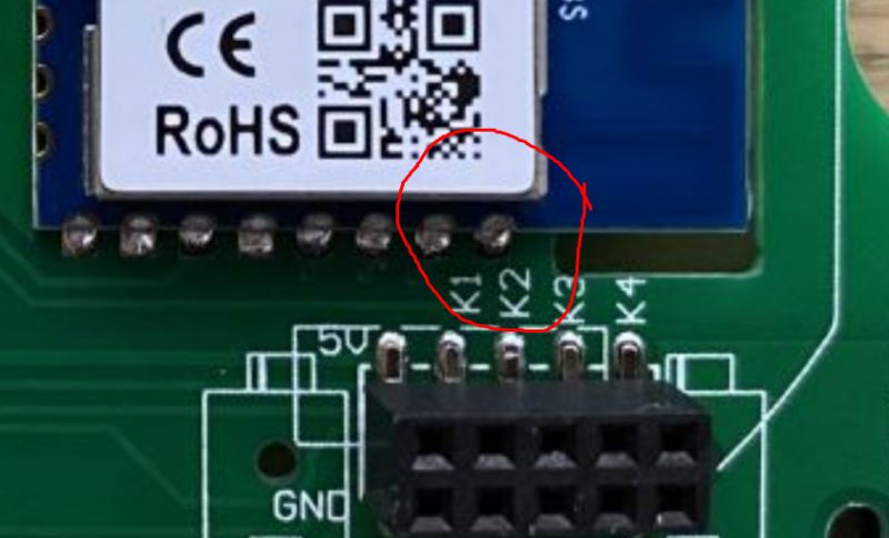 Close-up of a circuit board with a module labeled CE and RoHS.