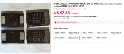 Cztery czarne kondensatory tantalowe SMD 220µF o oznaczeniu „33DPL d”.