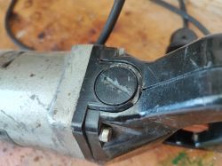 Damaged Component of Celma PRCb Drill Close-up of a damaged plastic component on an old Celma PRCb drill.