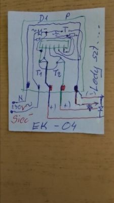 Hand-drawn electrical wiring diagram on a piece of paper.