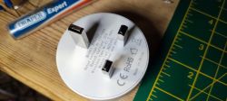 Close-up of the rear of the WHDZ03 device with plug and markings.
