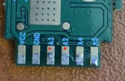 Close-up of a PCB with labeled pins: VCC, GND, A3, A2, A4, A5