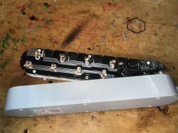 Inside Overmax Flow Multi Control Interior of the Overmax Flow Multi Control power strip on a wooden table.