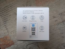 Smart Plug Packaging with Features Smart plug packaging with features like voice control, energy monitoring, scheduling, and app control.
