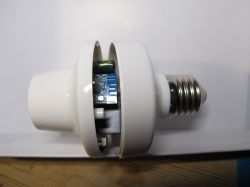 Disassembled Lighting Adapter Disassembled lighting adapter with visible electronic circuit.