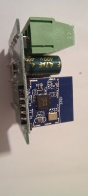 CB2S Dual Switch Module Close-up of the CB2S switch module electronics with a visible PCB and large capacitor.