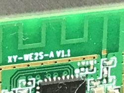 Close-up of electronic module XY-WE2S-A V1.1 with visible components and traces.