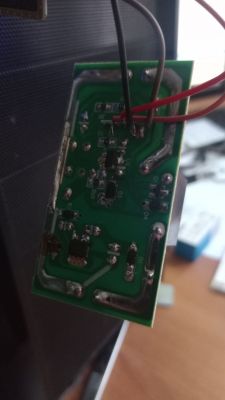 Electronic Circuit Board with Wire Connections Electronic circuit board with wires connected to various components.