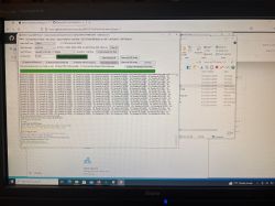 Computer screen displaying the BK7231 firmware flashing tool and a file explorer window.