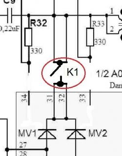 Section of an electronic circuit diagram with relay K1 and passive components.