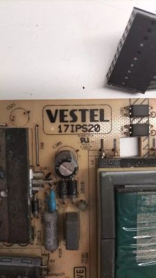 Vestel 17IPS20 power supply with visible components on a circuit board.