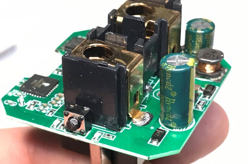 Close-up of Circuit Board with Capacitors Electronic circuit board with capacitors and sockets.