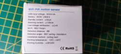 Back of WiFi PIR motion sensor packaging with technical information.