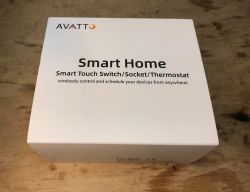 AVATTO Smart Home Box AVATTO Smart Home product box on a wooden surface.