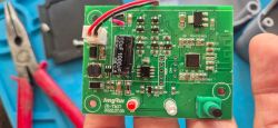 JingRui JR-TM17 Electronic PCB Board Printed circuit board with electronic components, a capacitor, wires, and an LED.