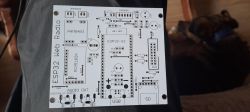 White PCB with the label ESP32 Web Radio and markings for electronic components.