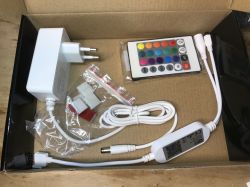 RGB LED Kit with Power Adapter and WiFi Controller RGB LED kit with power adapter, controller, and remote in the box.
