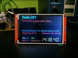 Color LCD screen displaying internet radio interface with weather and time info