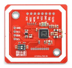 Electronic module with a red laminate, featuring integrated circuits and connectors labeled GND, VCC, SDA, SCL.