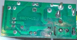 Image of a circuit board marked SBDY-V2.1, showing visible damage to the traces.