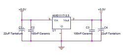 Circuit diagram of AMS1117-3.3 voltage regulator with capacitors.
