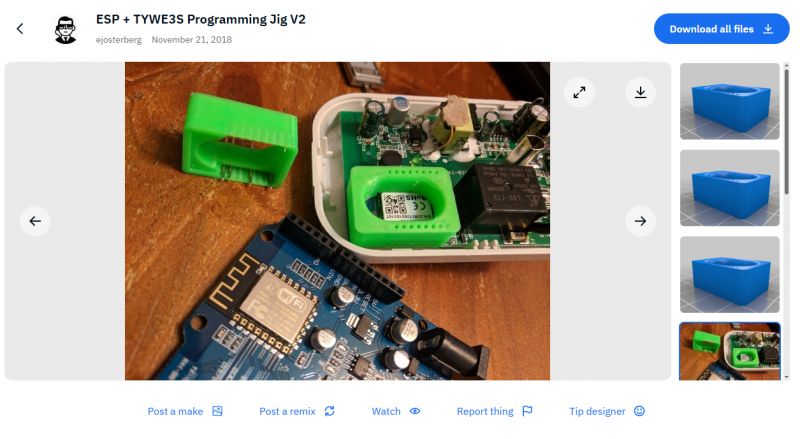 ESP programmer with a green TYWE3S jig on a table.