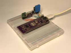 HLK-W801-KIT-V1.1 Board with Sensors on Breadboard HLK-W801-KIT-V1.1 development board on a breadboard with two sensors.
