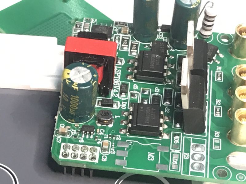 ATLO-TB2-TUYA two-button touch light switch with front panel removed, showing inner electronics.