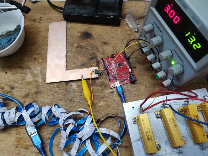 Arduino Test Setup with MOSFET and LED Strip Arduino connected to a MOSFET and LED strip on a test setup