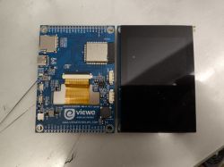 Electronic module with blue PCB and attached 320x480 touchscreen LCD display.