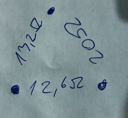 Trójkąt z wartościami oporności 13,2Ω, 23Ω i 12,65Ω zapisany na kartce.