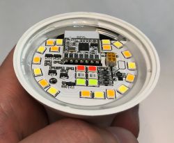 Inside View of eWeLink Zigbee LED Bulb with BL702 Module eWeLink Zigbee LED bulb opened, showing BZ2L (BL702) module and control transistors on PCB.