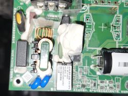 Power supply circuit board with electrical components PCB power supply module with coils, capacitors, and Chinese label markings