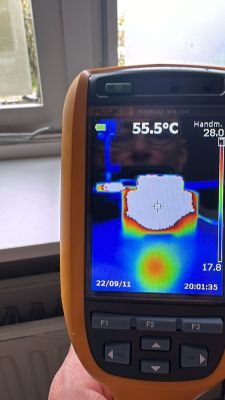 Fluke thermal imager displaying a temperature of 55.5°C.