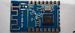 Electronic module HLK-B30 with CC8000 chip on a blue PCB
