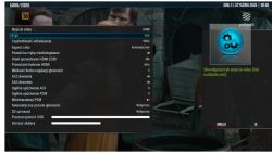 Menu ustawień audio/wideo na ekranie telewizora z widocznymi opcjami konfiguracji.