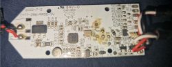 Printed Circuit Board of EKVIP Smart Ambient RGB Lamps Printed circuit board with electronic components and wires.
