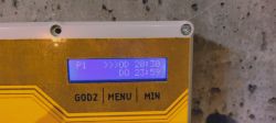 Dual-channel timer with an LCD display showing time settings.
