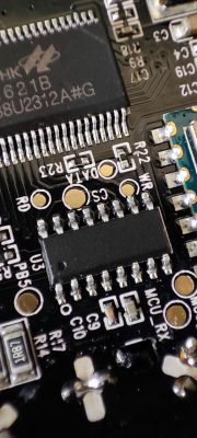Close-up of a PCB with Microchips Close-up of a PCB with visible microchips and track labels.